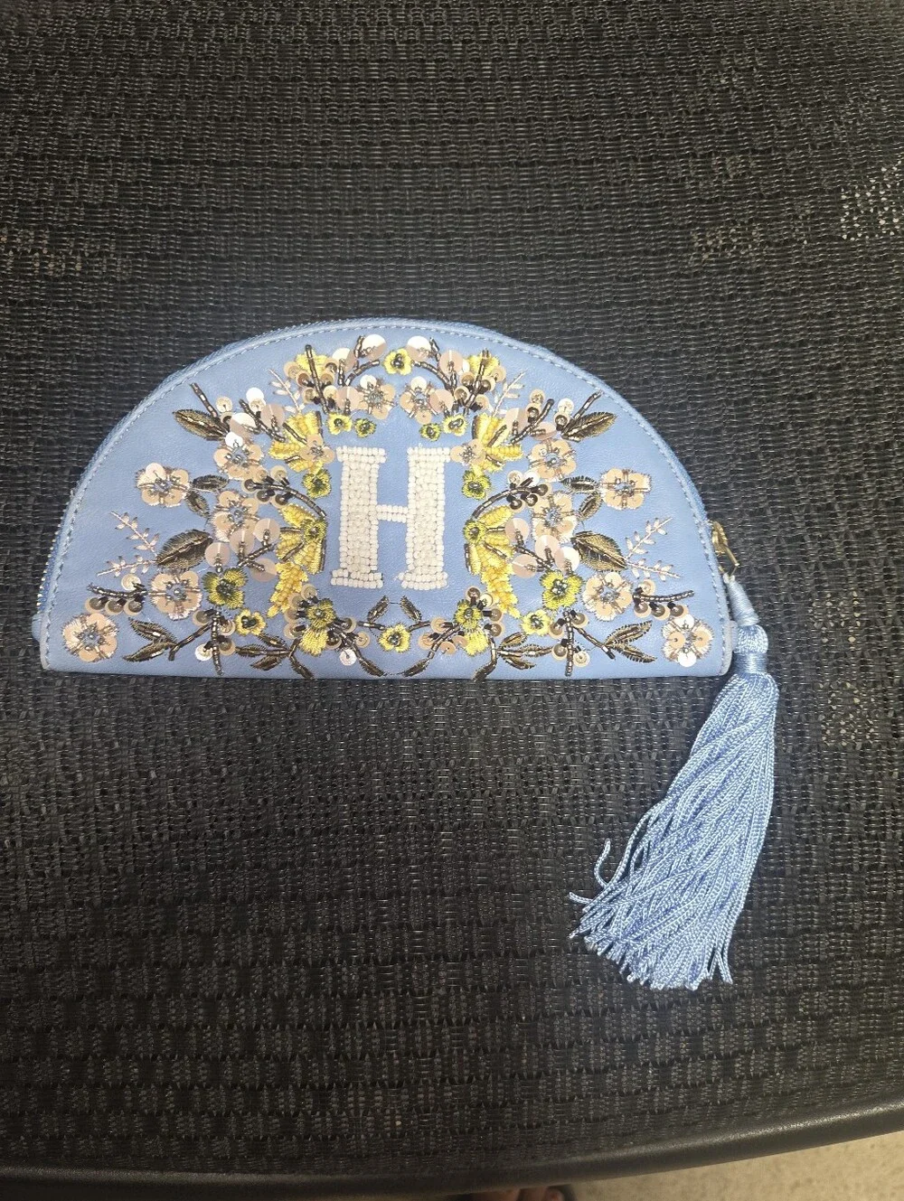 Anthropologie Light Blue Embroidered Floral Tassel Pouch with 'H' Monogram